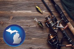 michigan map icon and fishing rods and reels