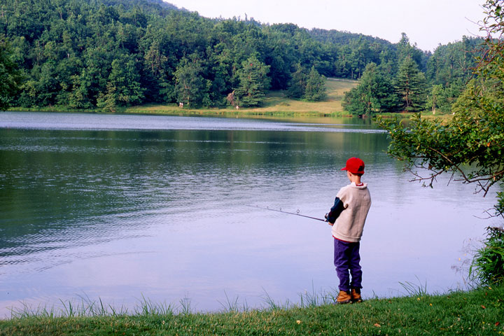 boy fishing in lake, Blue Ridge Mountains, Virginia